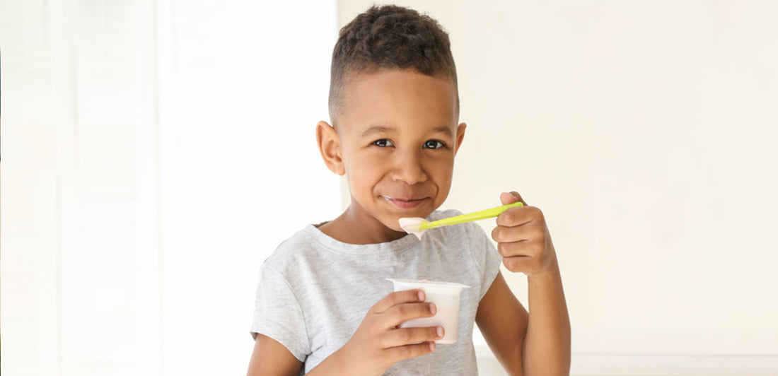 kid eating yogurt