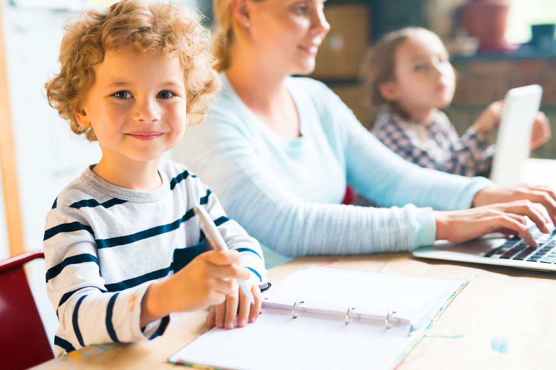 Kid writing new year resolution